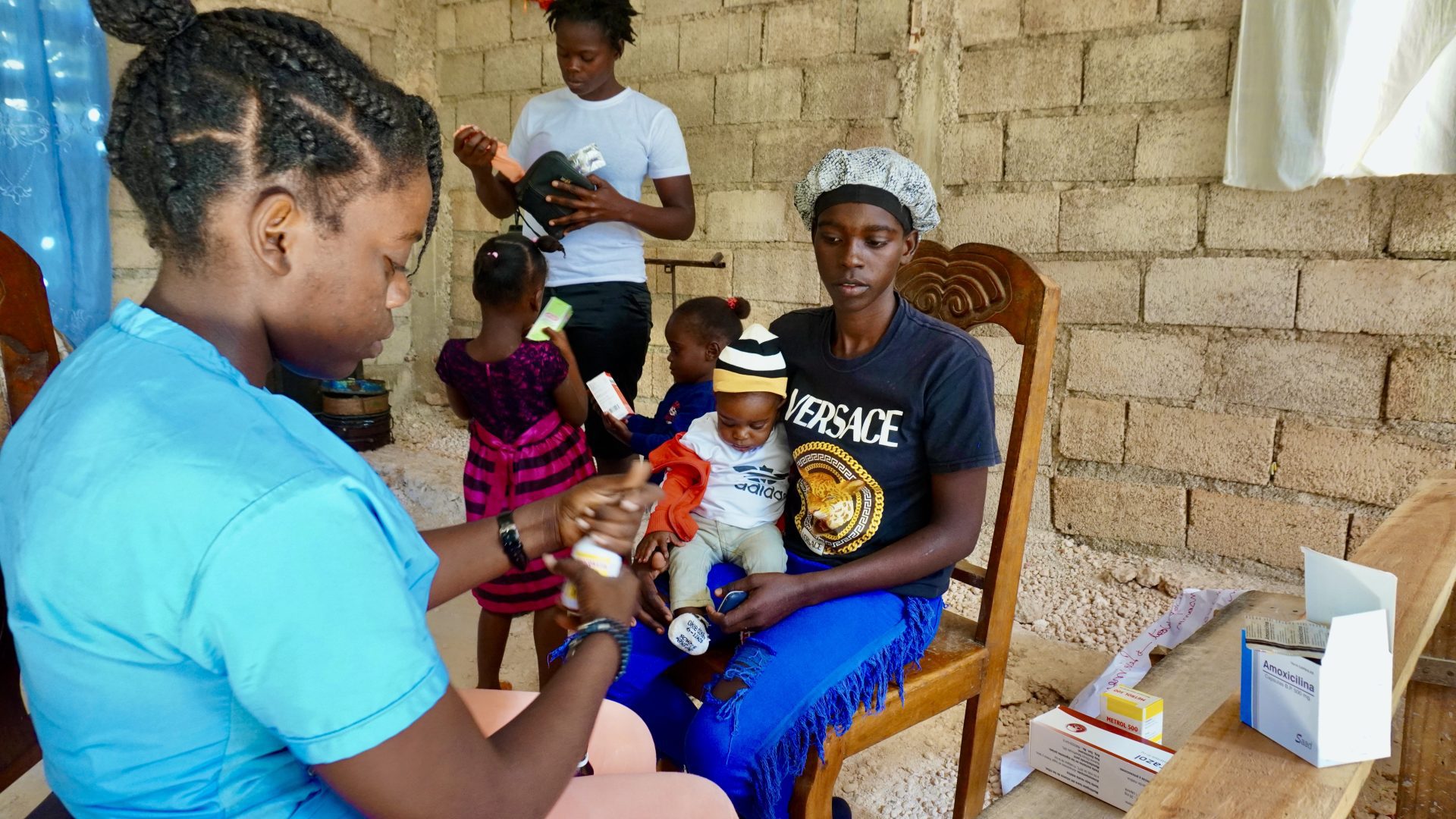 Mothers and their children at a BB-sponsored health clinic.